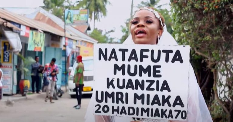 Tanzanian Lady Storms Streets In A Wedding Gown In Search Of A Husband